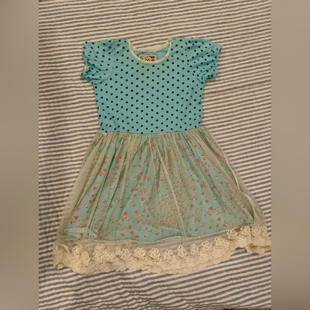 Liv and Monkey kids dress with lace and polka dots.